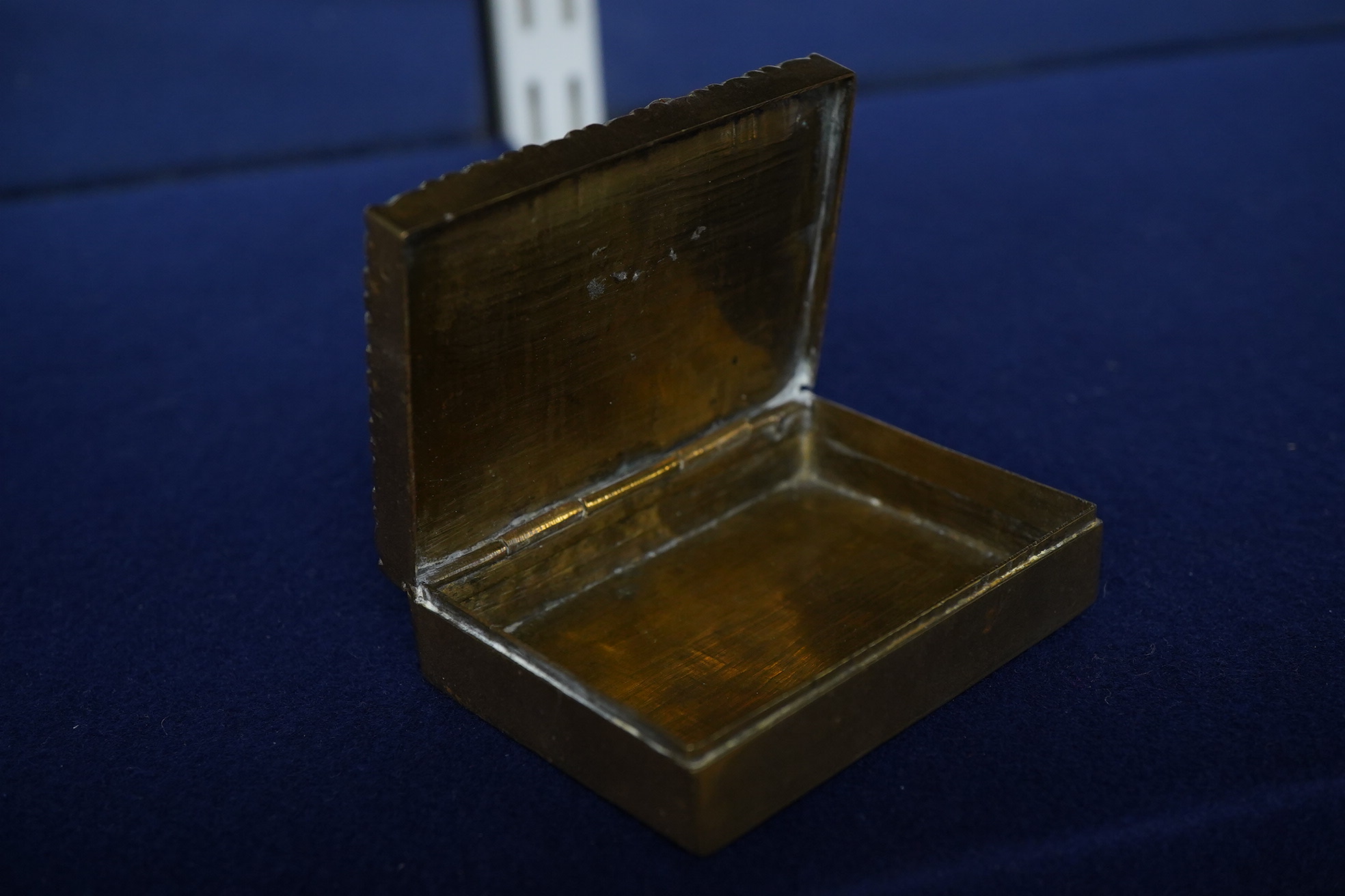 Two miniature turquoise inlaid easel frames and a similar box, largest 18cm high